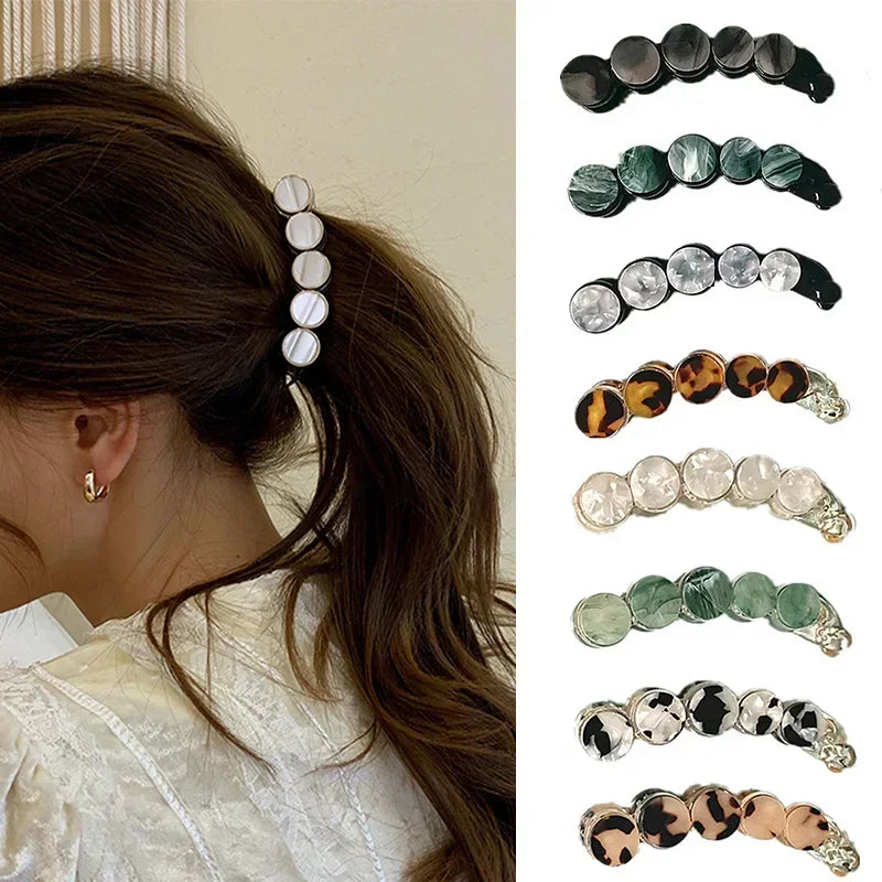 Déclinaisons de couleurs de la pince à cheveux banane en acétate effet marbre - Chic & Coquette
