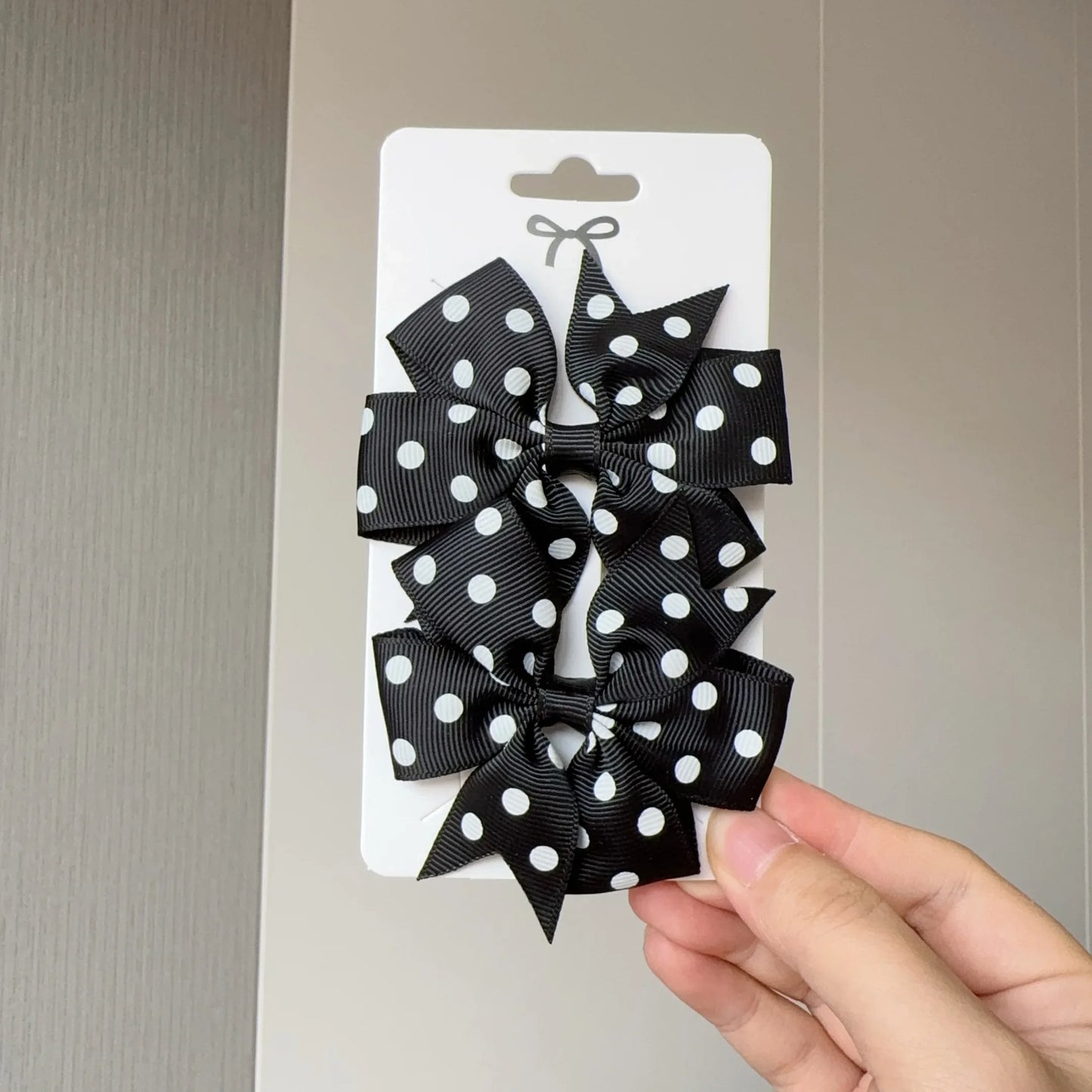 Lot 2 barrettes bébé fille à nœuds imprimés pois blancs – âge 1-3 ans Noir - Chic & Coquette