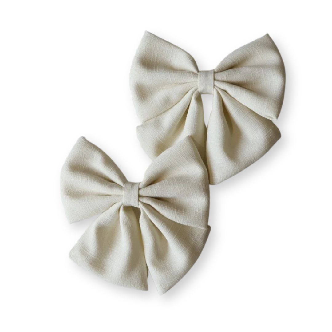 Barrette bébé grand nœud papillon en lin – 10 coloris unis Rose bonbon - Chic & Coquette