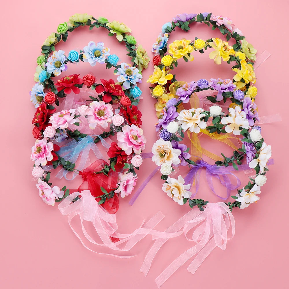 différentes couleurs de couronnes de fleurs bohémya sur fond rose