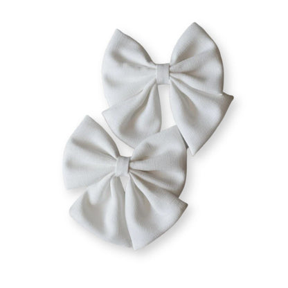 Barrette bébé grand nœud papillon en lin – 10 coloris unis Bleu - Chic & Coquette