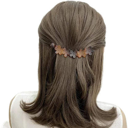 Pince à cheveux banane ornée de fleurs en plastique Léopard - Chic & Coquette