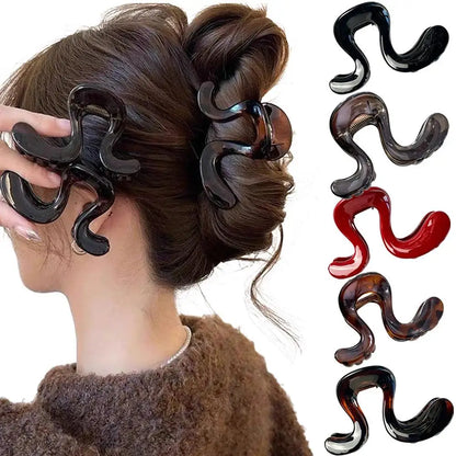 Illustration des différentes couleurs de pinces à cheveux crabe acétate brillant en forme de S - Chic & Coquette