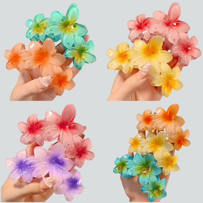 Pince à cheveux 3 fleurs en plastique | Fleurs de frangipanier Orange - Chic & Coquette